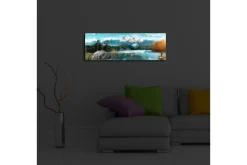 Lerretsbilde med LED-belysning 30x90 cm - Storslått fjellandskap med en fisker i en båt på en speilblank innsjø