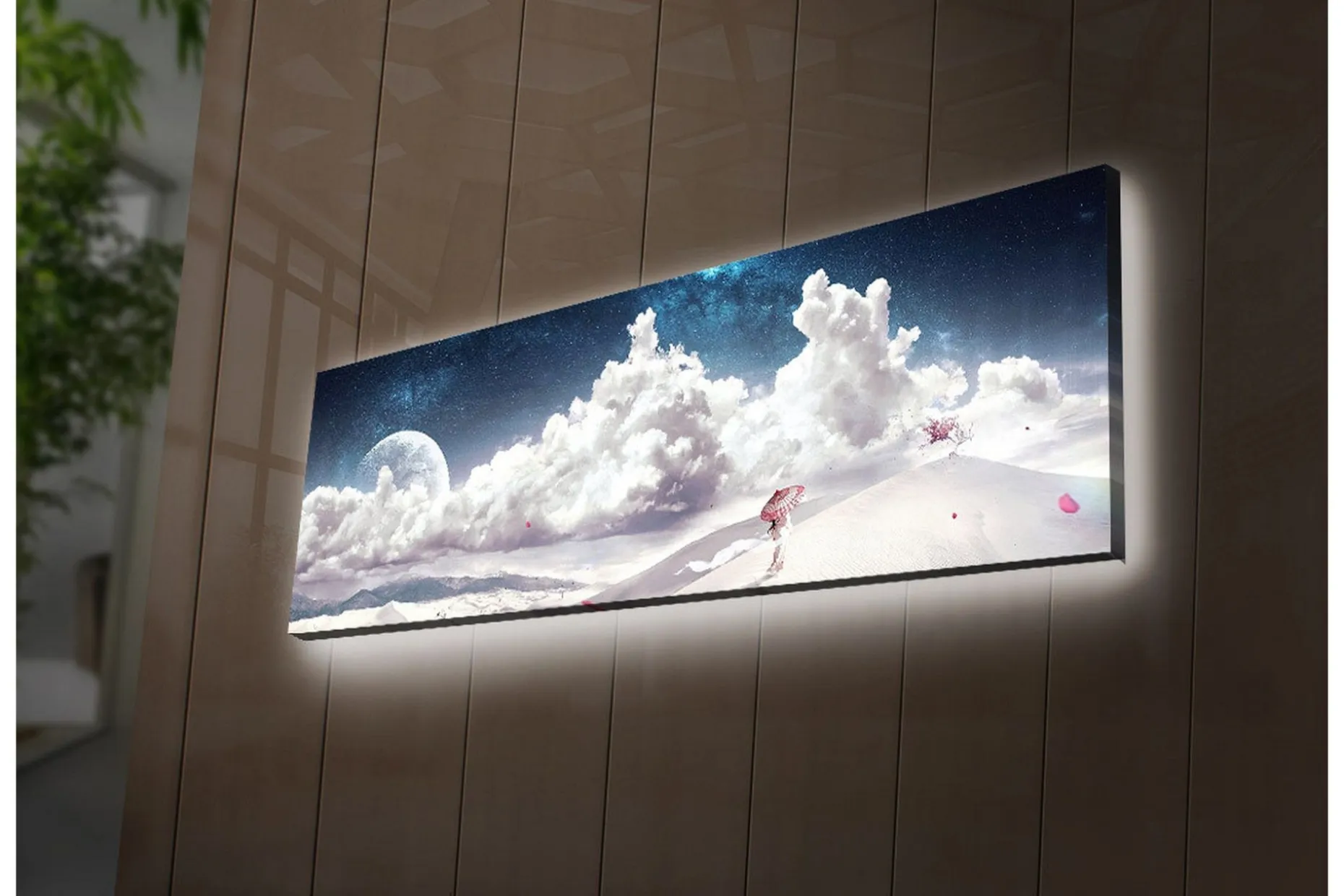 Lerretsbilde med LED-belysning 30x90 cm - Drømmeaktig landskap med en enslig figur som bærer en paraply i et snødekt miljø under en stjerneklar himmel