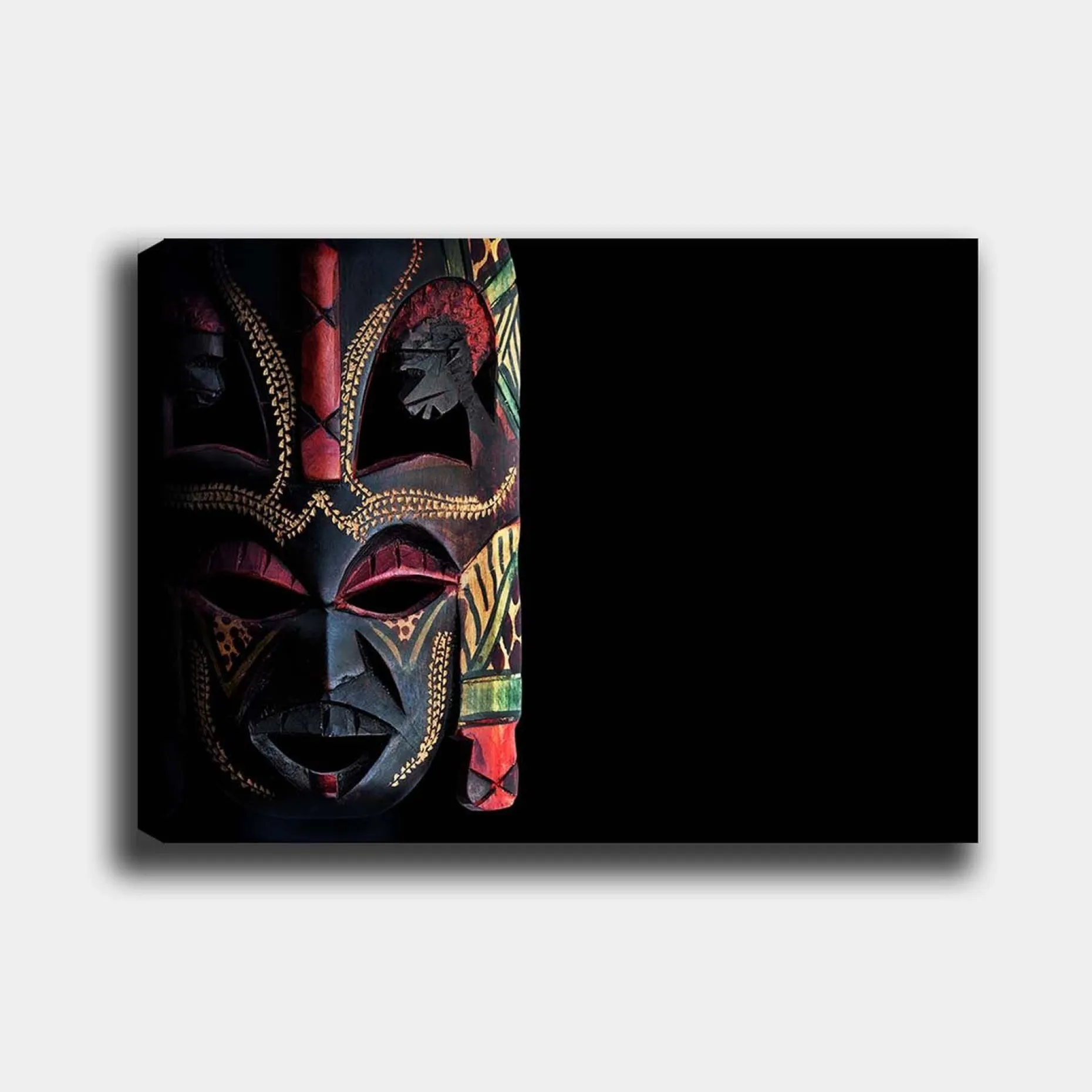 Lerretsbilde 70x100 cm - Fargerik afrikansk maske med detaljerte mønstre og uttrykksfulle trekk