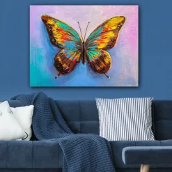 Lerretsbilde 70x100 cm - Fargerik sommerfugl med detaljerte vinger